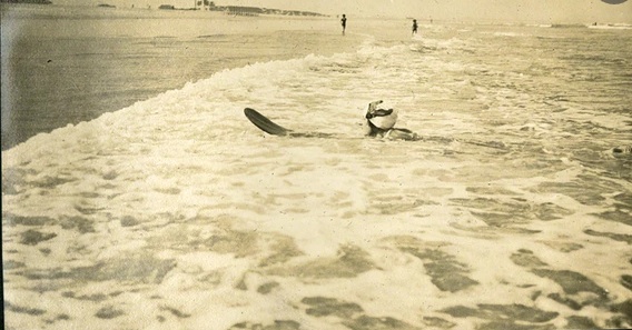 Agatha Christie surfing. (Photo: Agatha Christie Ltd)